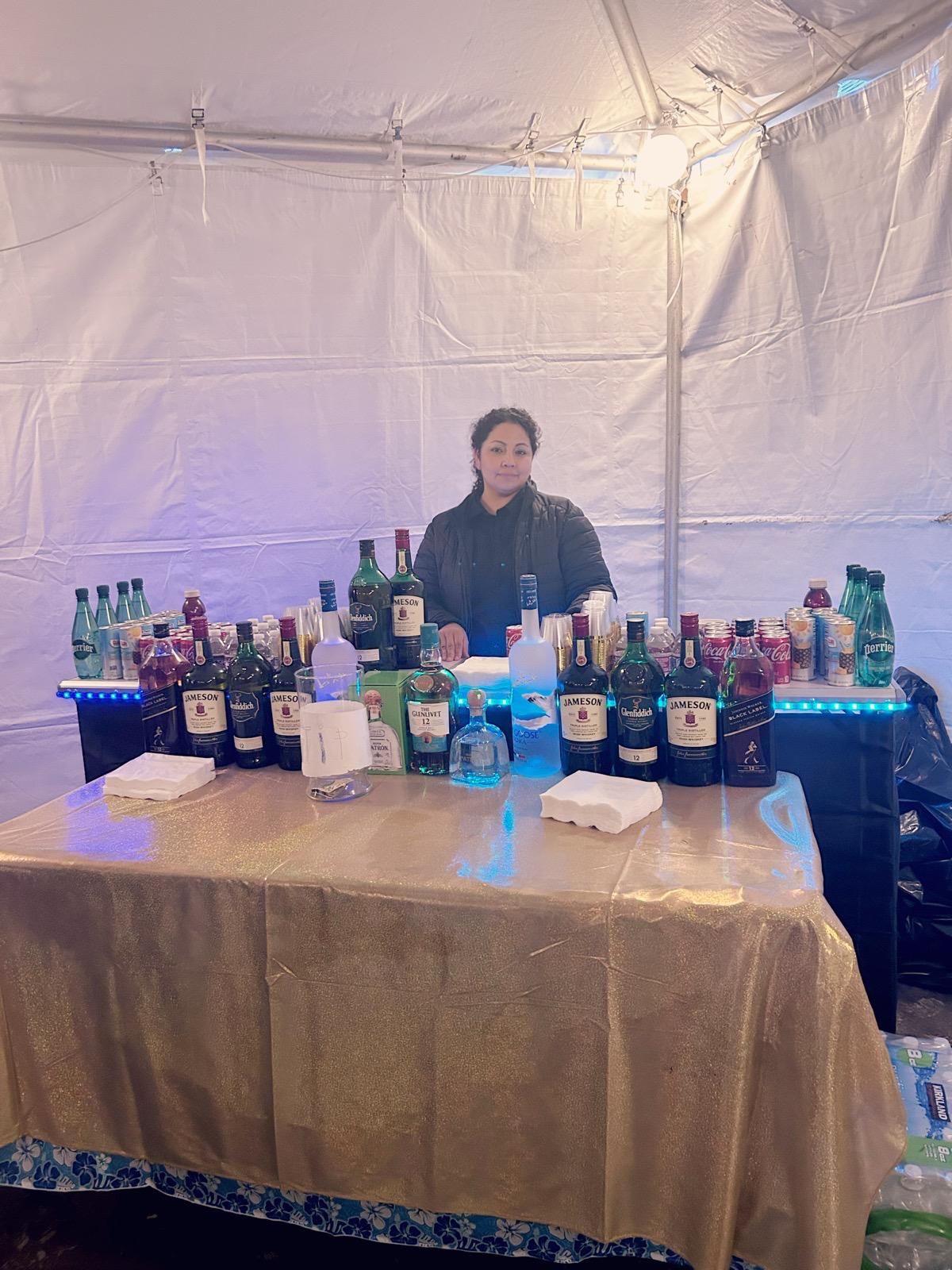 Bartender preparing a cocktail.