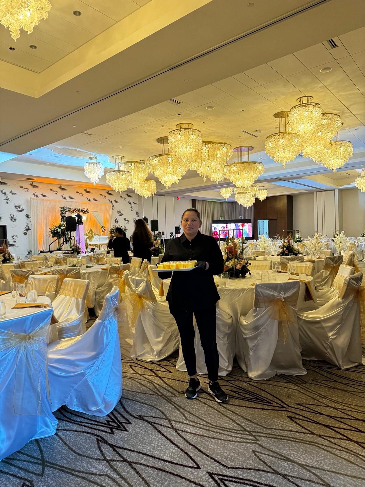 Server at a gala dinner.